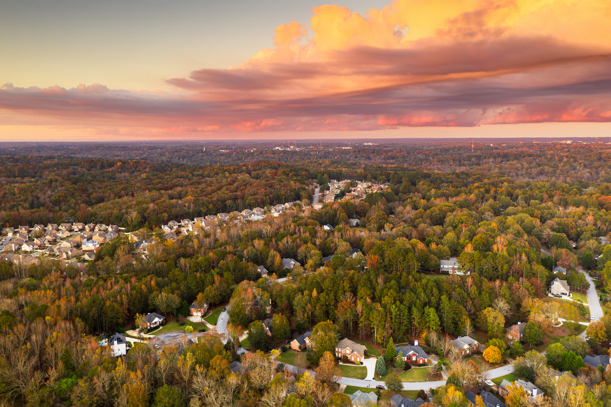 Colorful sunset over suburban neighborhood